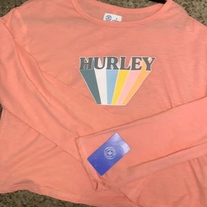 Two Hurley shirts yellow and pink.
